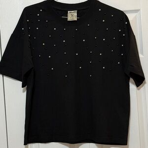 Vocal black top with pearl embellishment